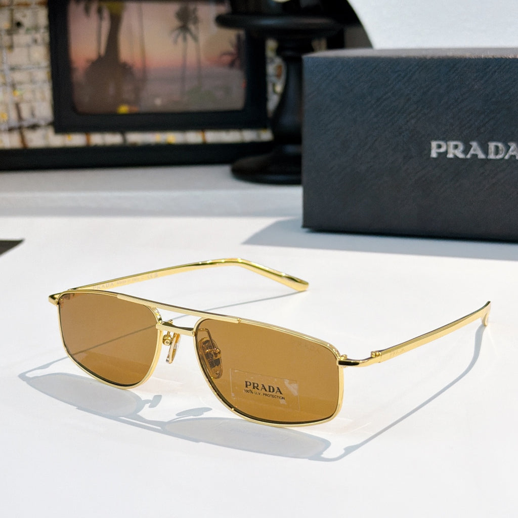 Prada sunglasses with amber lenses and gold-tone frame