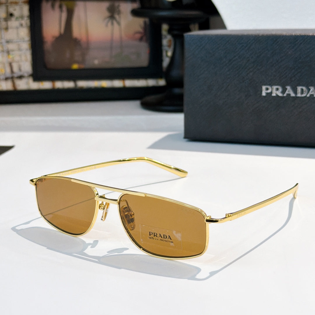 Prada sunglasses with amber lenses and gold-tone frame