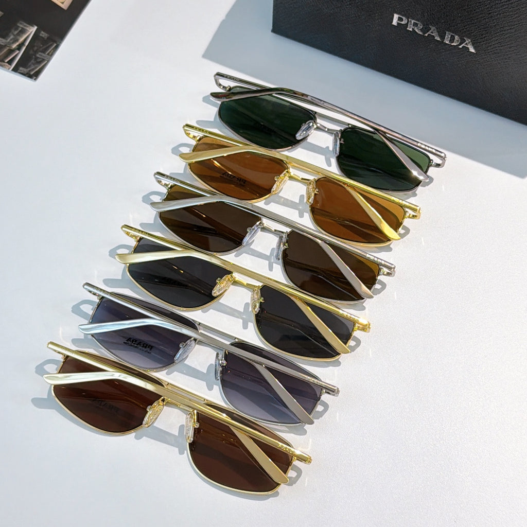 Prada sunglasses assortment with mixed lenses on metal frames