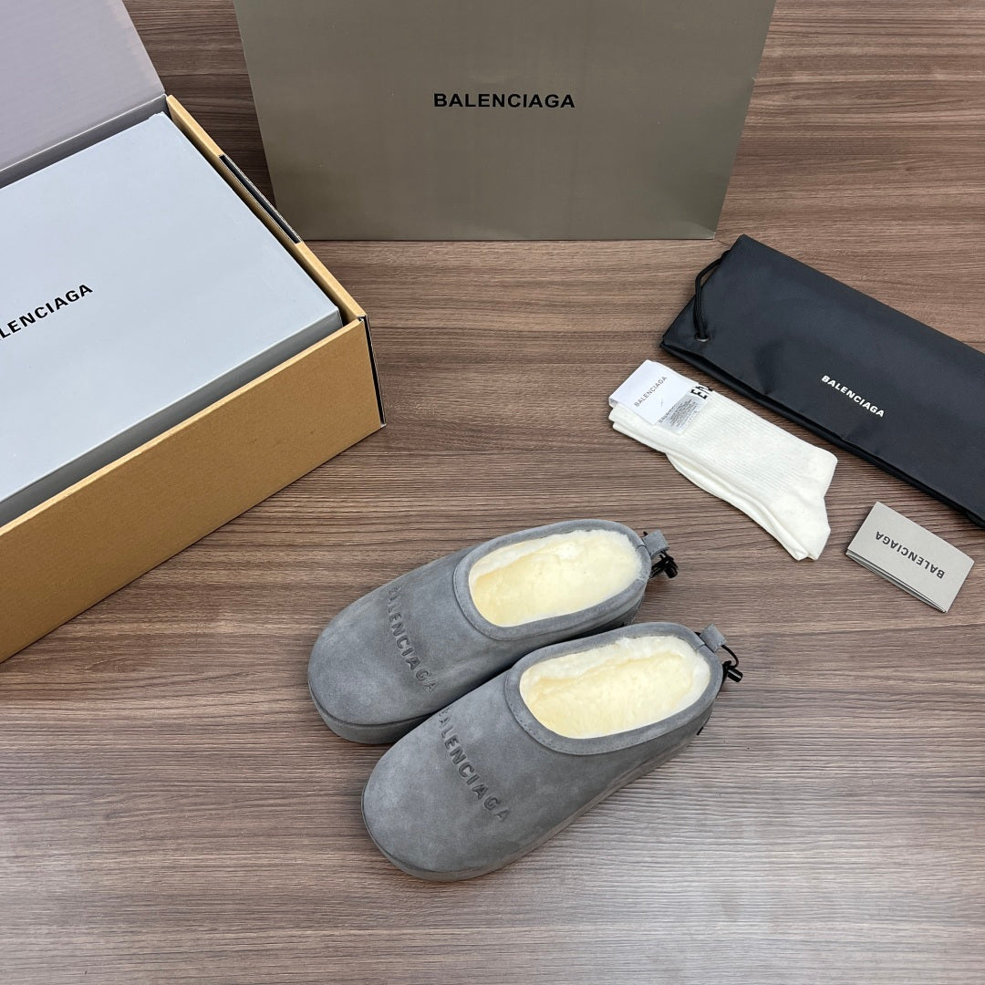 Balenciaga gray suede mules with cream fleece lining and lace bow ties