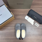 Balenciaga gray suede slip-on mules with cream-lined interior and lace ties
