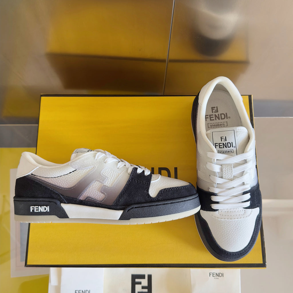 Low-top sneakers in box, white leather uppers with black heel and side stripes, lace-up