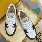 Low-top sneakers with white uppers, black toe and side panels, lace-up with FENDI logo