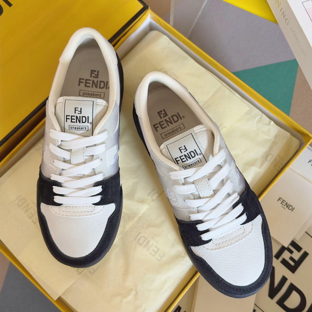 Low-top sneakers with white uppers, black toe and side panels, lace-up with FENDI logo