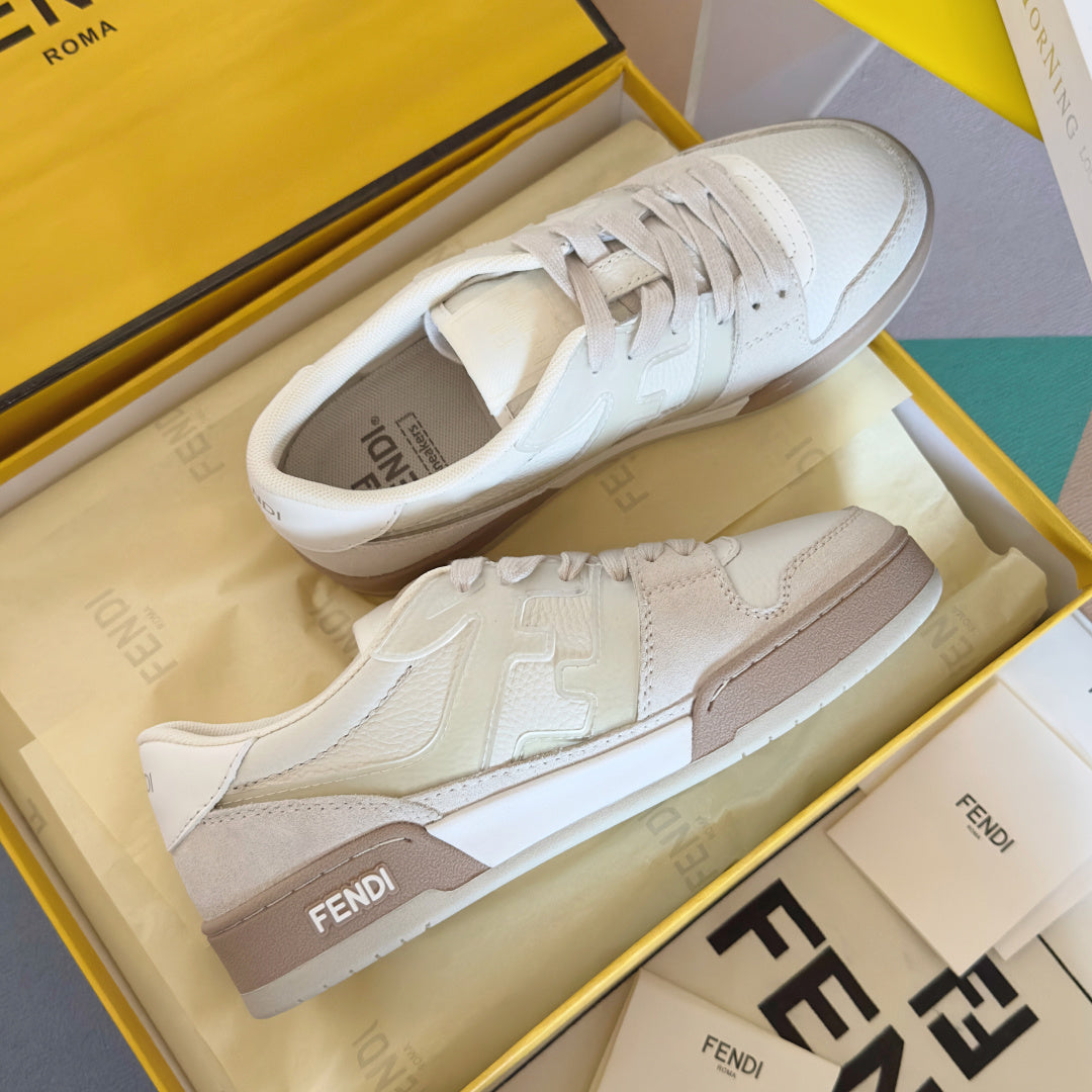 Fendi unisex sneakers, white leather lace-up with beige panel accents and padded tongue.