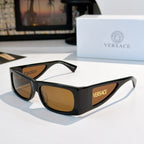 Versace sunglasses with dark frame and brown tinted lenses, side Versace logo.