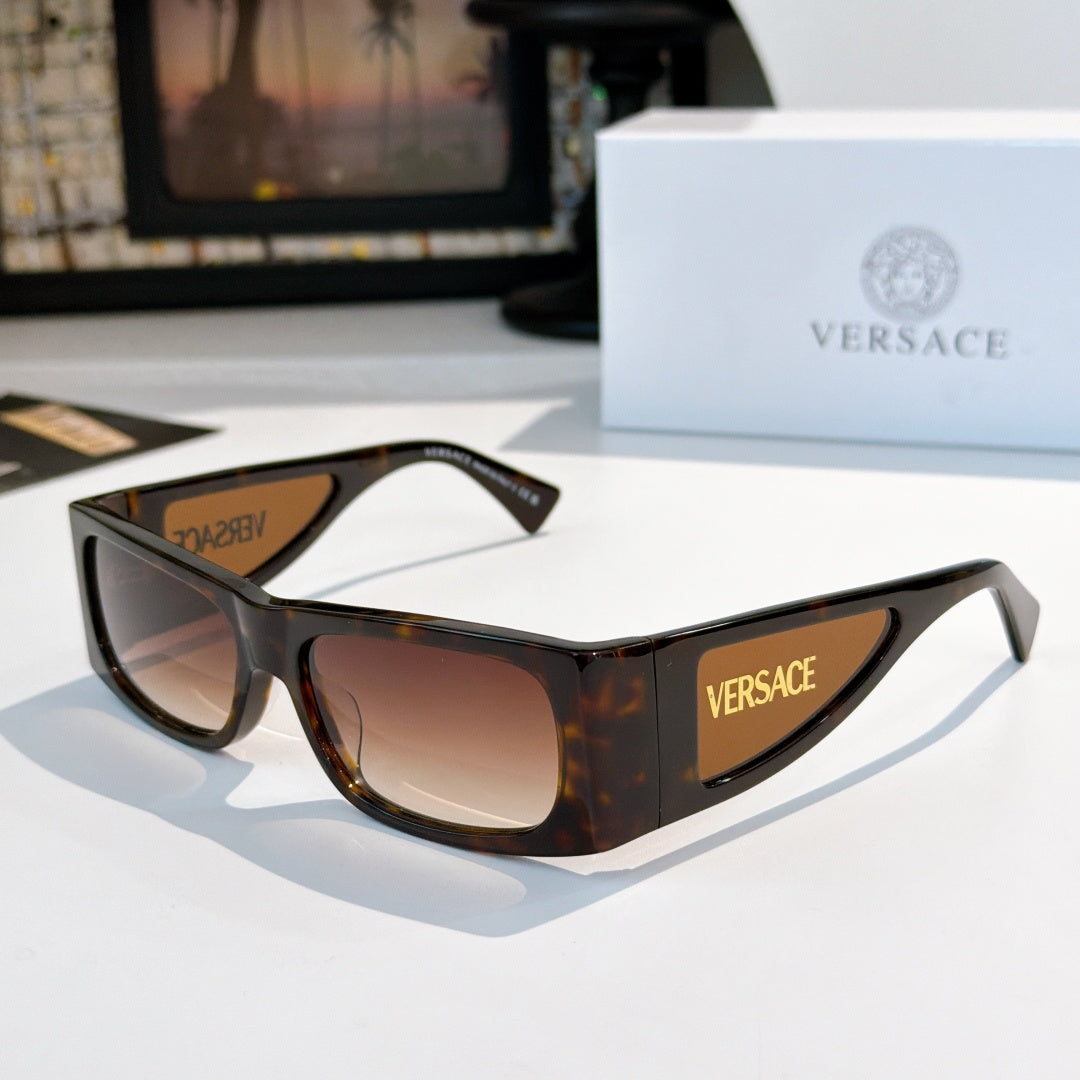 Versace sunglasses with tortoiseshell frame and brown lenses, side Versace logo.