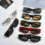 Versace sunglasses assortment with different colored frames and gold Greek key temples