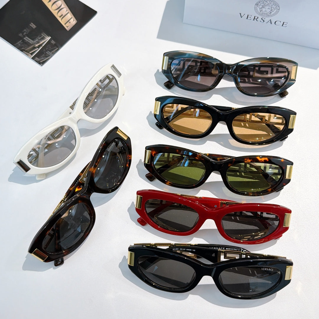 Versace sunglasses assortment with different colored frames and gold Greek key temples