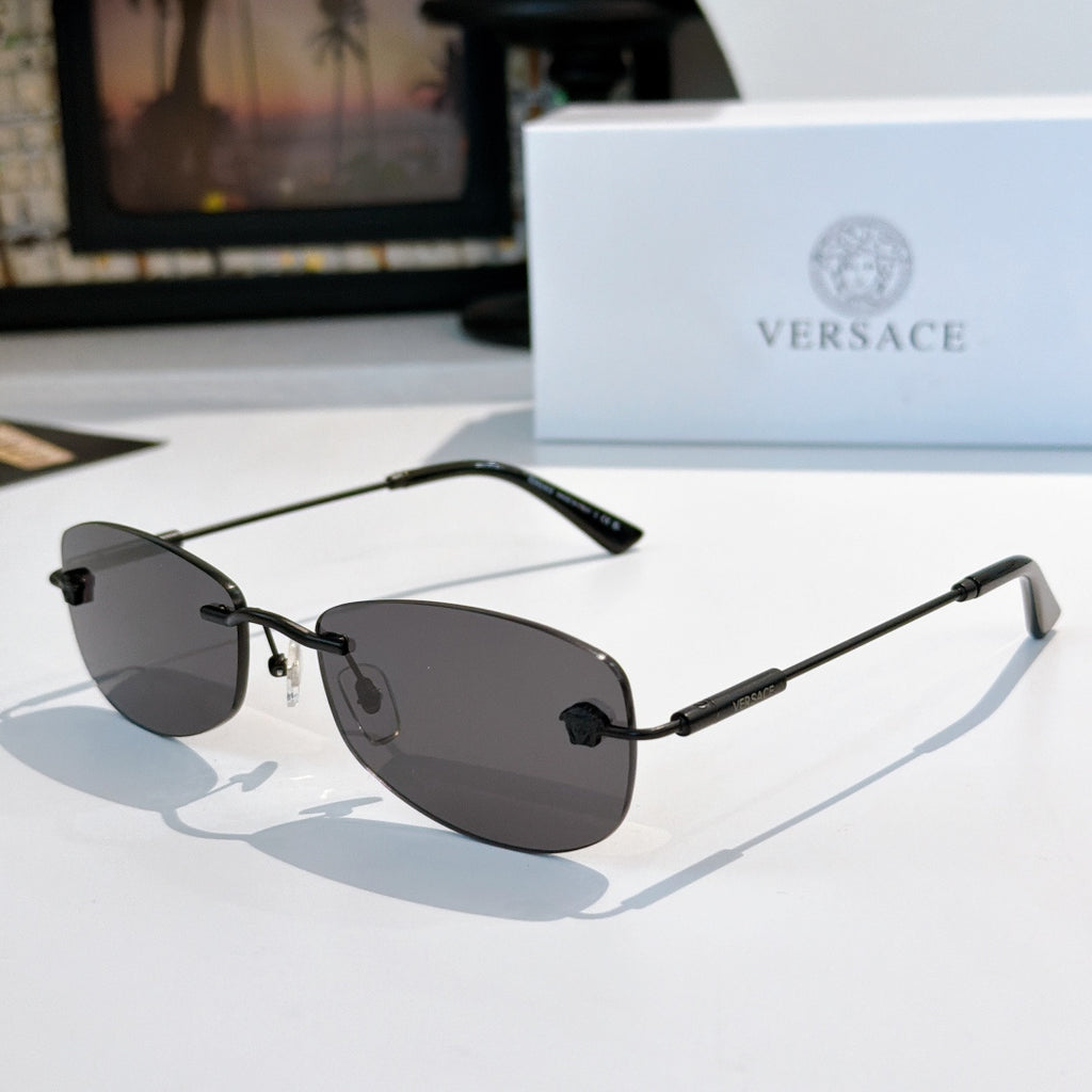 Sunglasses with black metal frame and dark lenses