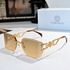 Versace sunglasses with gold-tone frame and warm tan tinted lenses