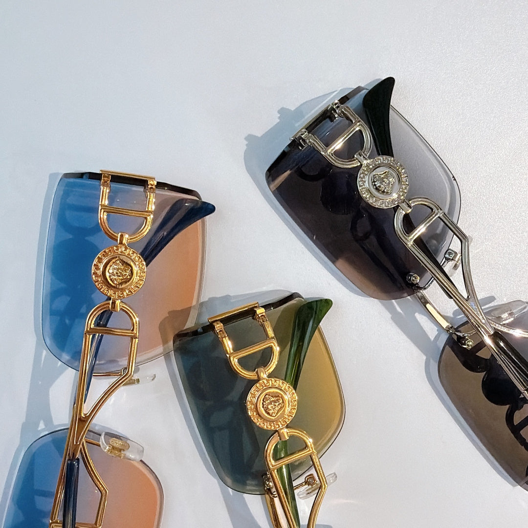 Versace sunglasses assortment with gold-tone frames and colored lenses