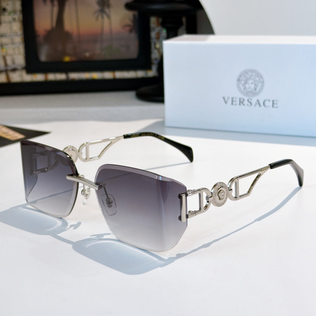 Versace sunglasses with silver-tone frame and dark purple tinted lenses