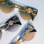 Three gold-frame cat-eye sunglasses with blue and tan gradient mirrored lenses.