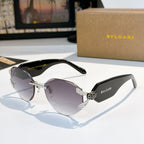Bvlgari sunglasses with purple gradient lenses, black frame, and silver-tone hinge details