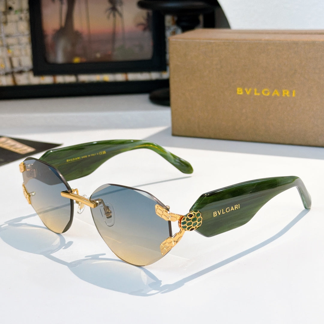 Bvlgari sunglasses with green gradient lenses, green frame, and gold-tone hinge ornament