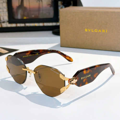 Bvlgari sunglasses with brown gradient lenses, tortoise frame, and gold-tone hinge detail