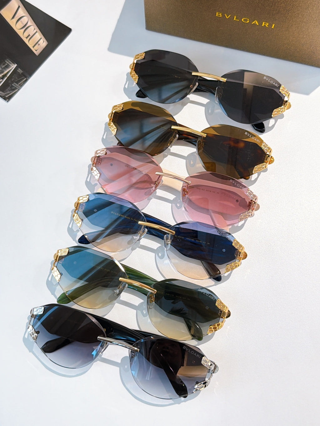 Bvlgari sunglasses set showing assorted lens tints and frame colors with gold-tone accents