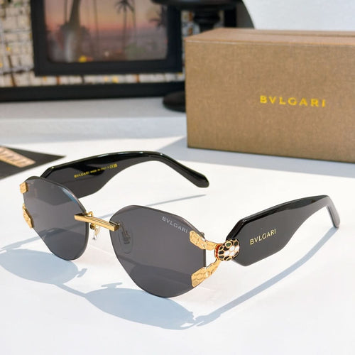 Bvlgari sunglasses with dark gray lenses, black frame, and gold-tone detailing at hinges