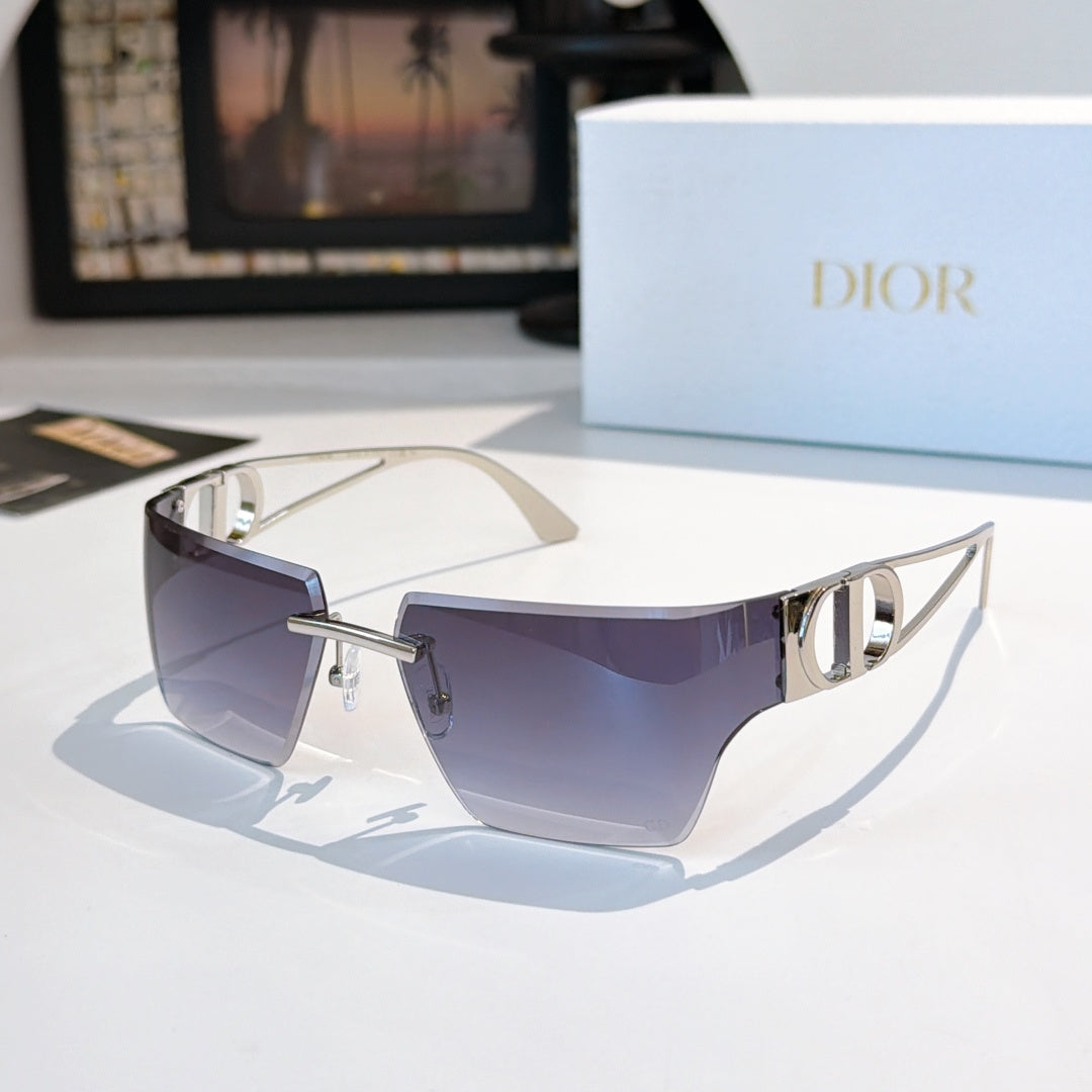 Sunglasses with dark purple gradient lenses and silver-to-gold frame, shield shape
