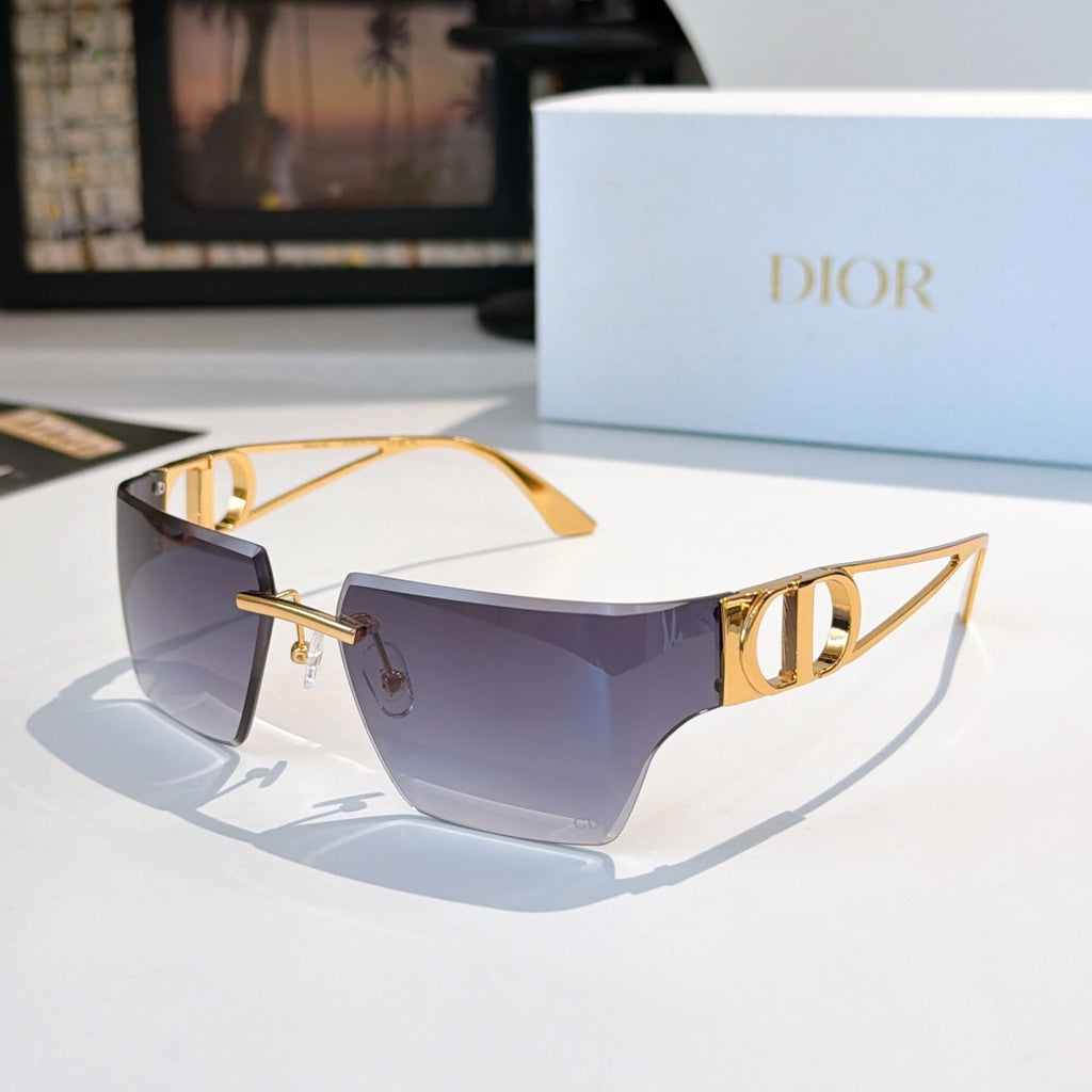 Sunglasses with deep violet gradient lenses and gold-tone frame, shield shape