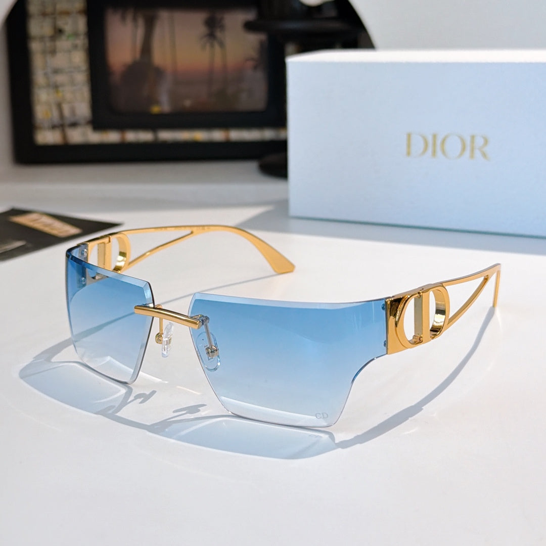Sunglasses with sky-blue gradient lenses and gold-tone frame, shield shape