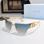 Sunglasses with light blue gradient lenses and gold-tone frame, shield shape