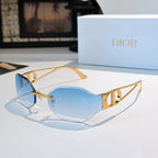 Dior sunglasses with blue lenses and gold-tone frames
