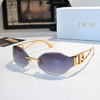 Dior sunglasses with dark purple lenses and gold-tone frames