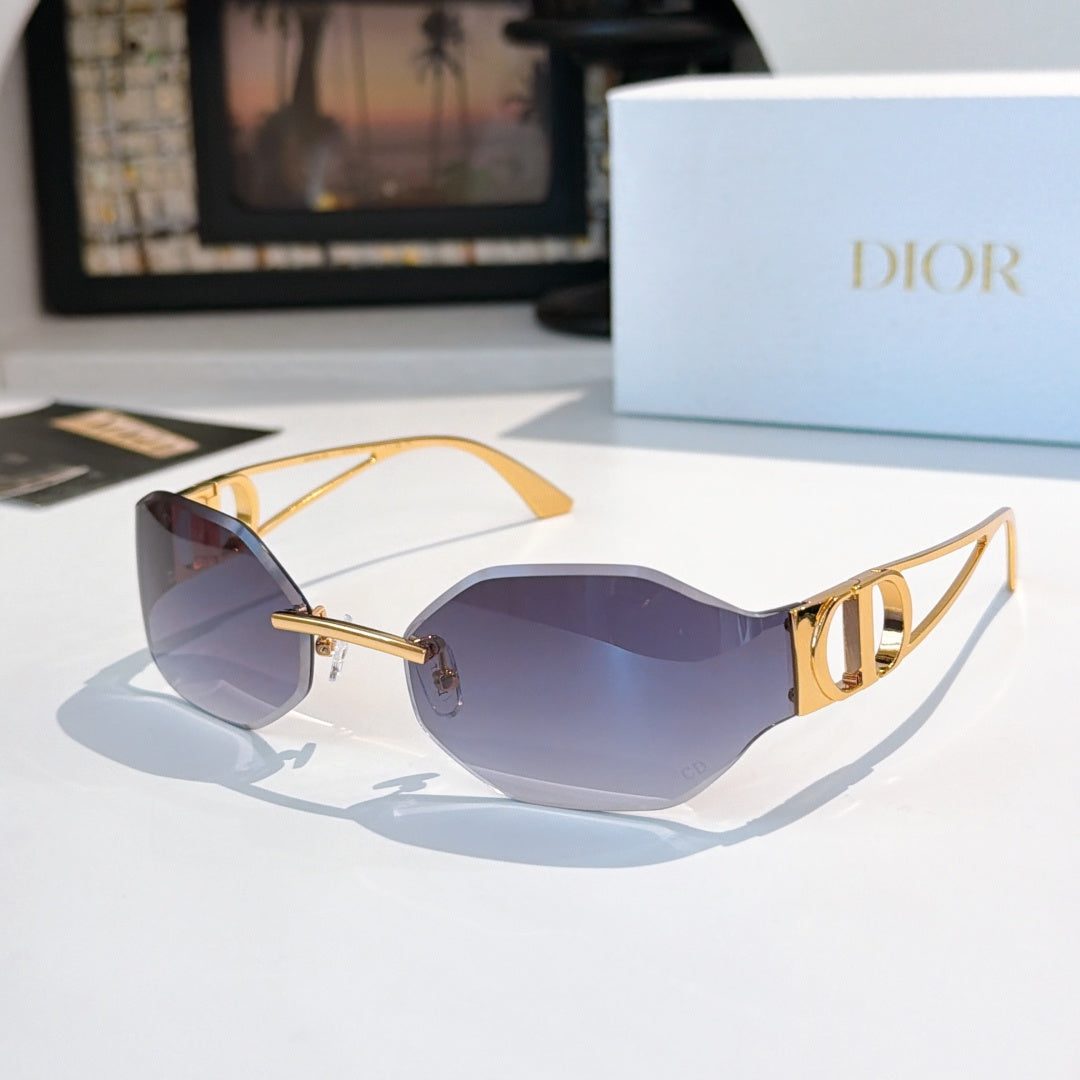 Dior sunglasses with dark purple lenses and gold-tone frames