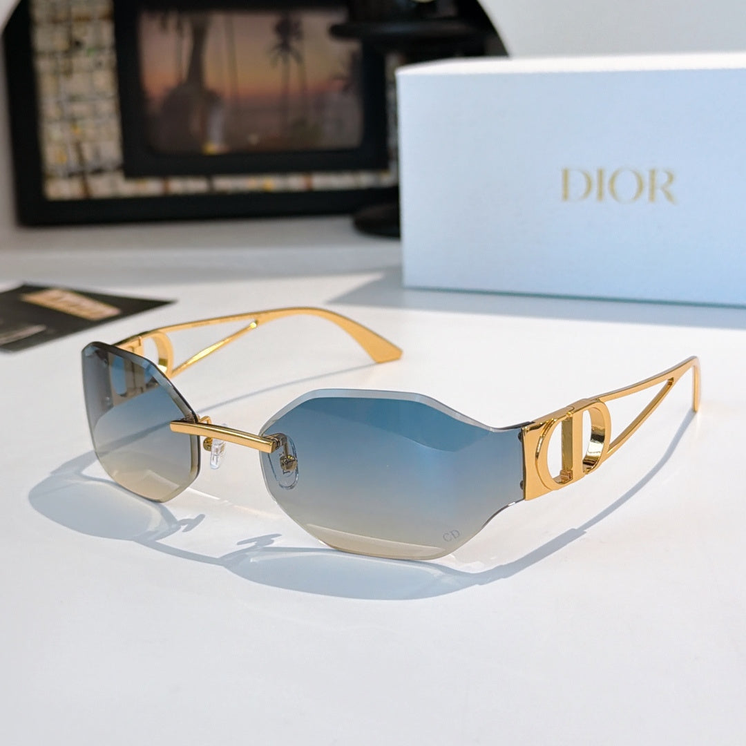 Dior sunglasses with light blue lenses and gold-tone frames