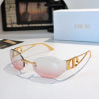 Dior sunglasses with light pink lenses and gold-tone frames