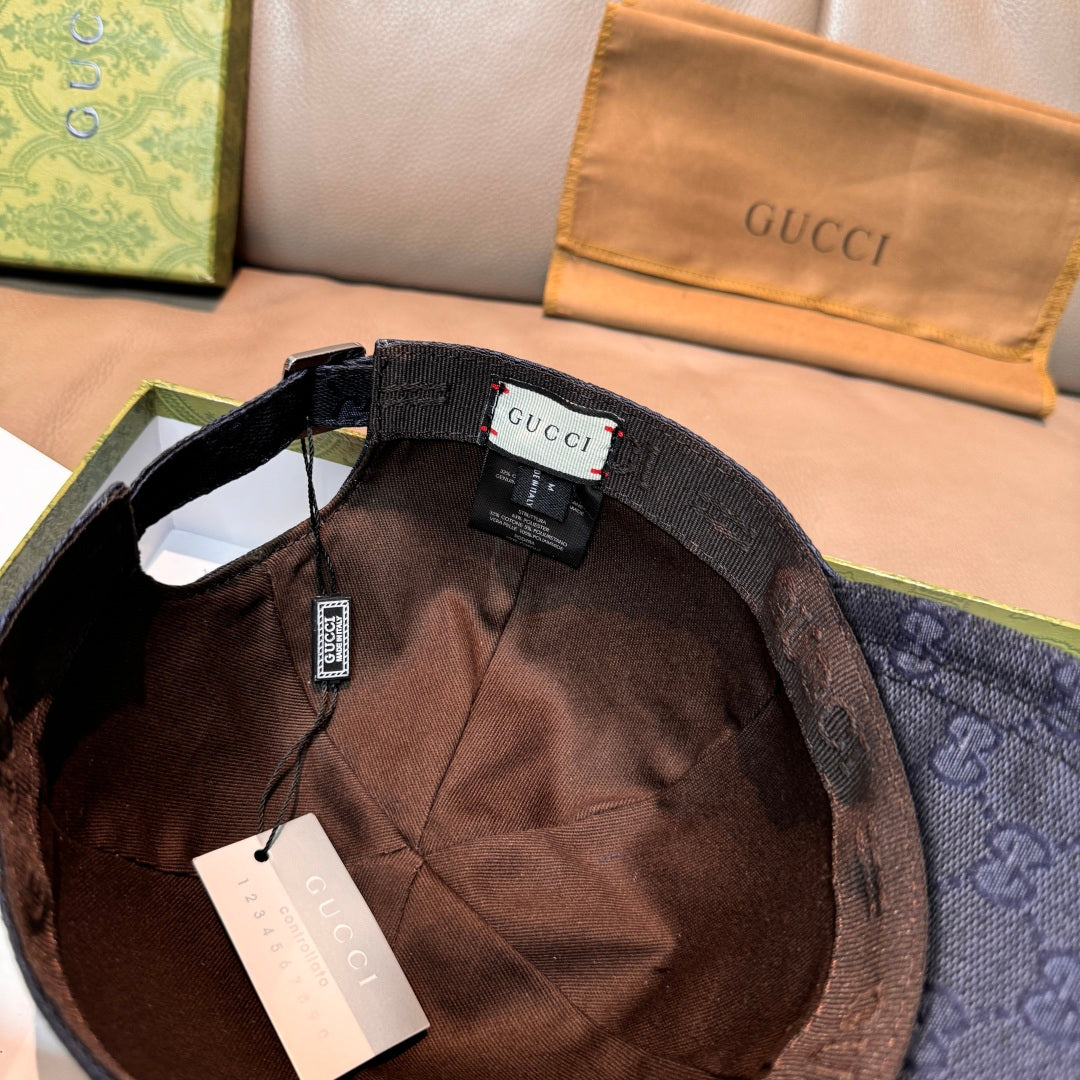 Gucci cap interior with brown lining and hanging tags, navy GG monogram