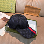 Gucci baseball cap with navy GG monogram print and red side stripe
