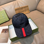 Gucci baseball cap with navy GG monogram and red stripe on the side