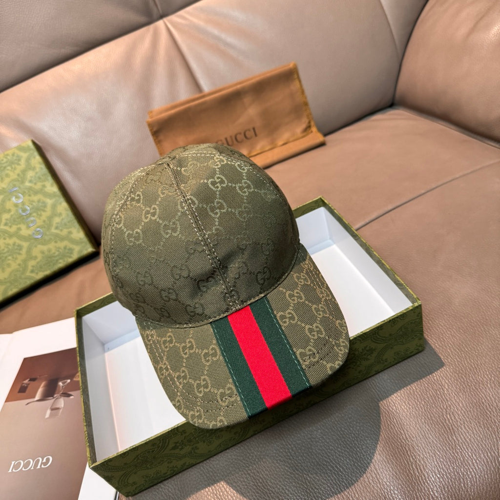 GG canvas cap in dark green with allover logo print and multicolor Web stripe panel