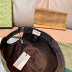 Gucci GG baseball cap with black interior lining and adjustable strap, label tags visible
