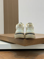 Givenchy white sneakers, heel view with rear pull tab and rubber sole