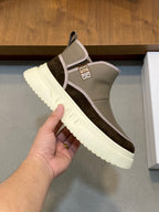 Givenchy slip-on sneaker in taupe with dark side stripe and white outsole