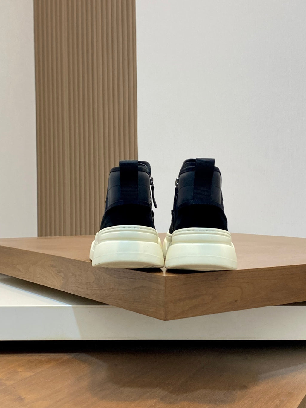 Givenchy dark sneakers with white outsole, back view pair