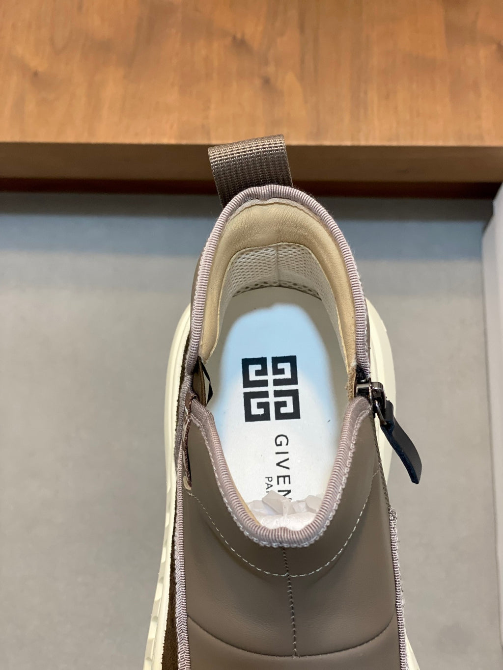 Givenchy slip-on sneaker with GIVENCHY logo on tongue, taupe and dark accents