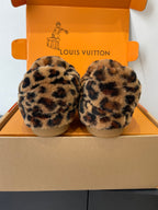 Leopard-print faux-fur slip-on shoes from front view