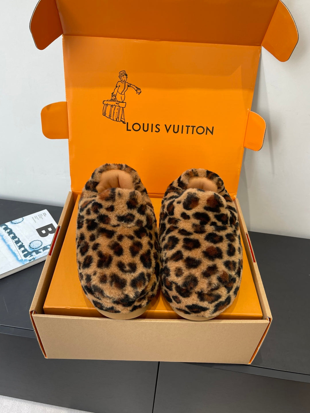 Leopard-print faux-fur slip-on shoes with beige soles, Louis Vuitton