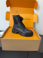 Louis Vuitton unisex black leather lace-up ankle boot with round toe and tread sole