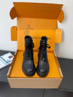 Louis Vuitton unisex black leather lace-up ankle boots with chunky tread sole
