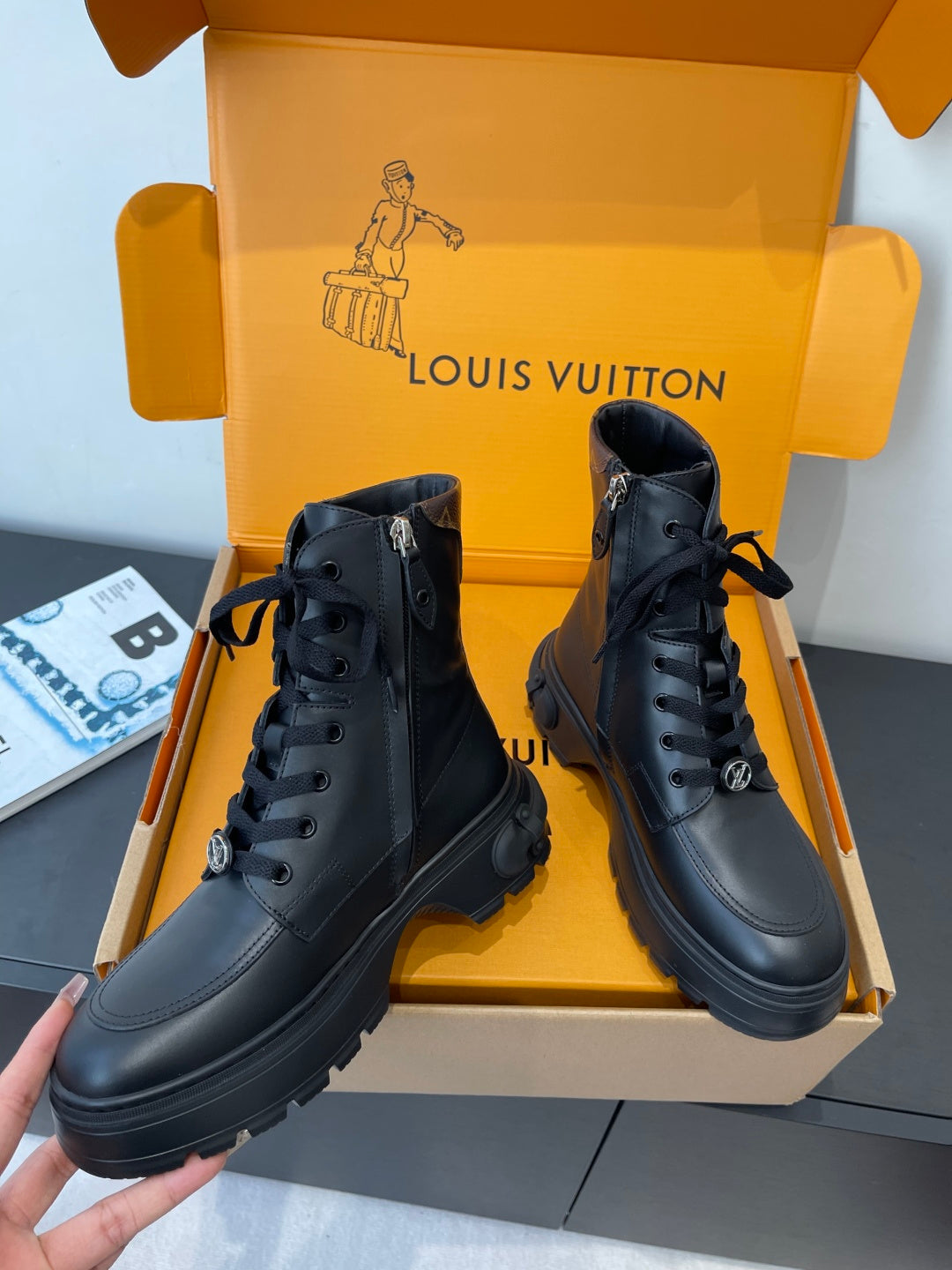 Louis Vuitton unisex black lace-up ankle boots, rugged sole and lace-up eyelets