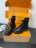 Louis Vuitton unisex black leather lace-up ankle boots with padded collar and thick tread
