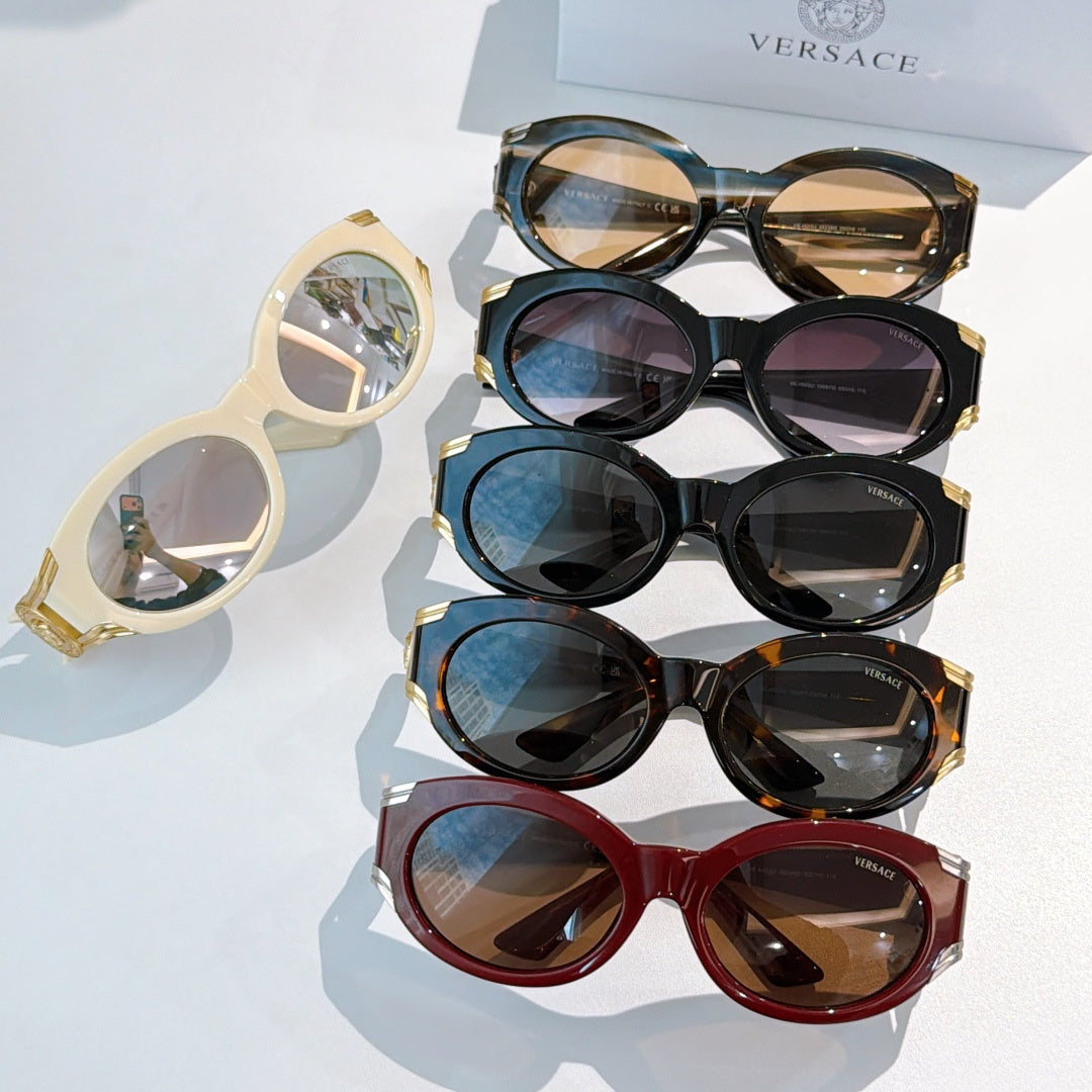Assorted sunglasses set with cream, black, blue, orange, and red frames with tinted lenses