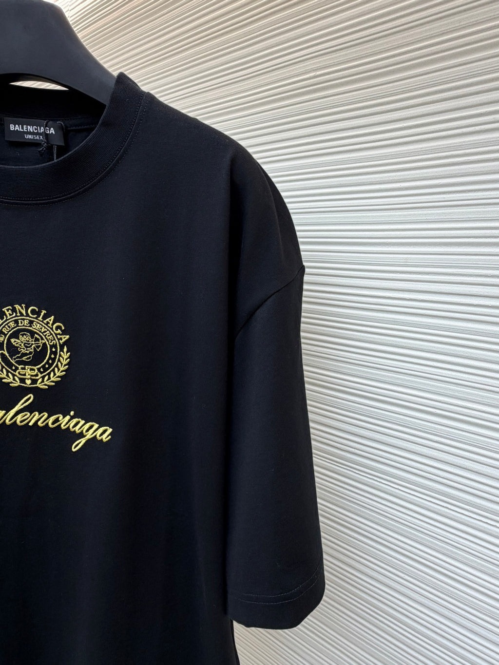 Dark short-sleeve T-shirt with Balenciaga gold crest detail