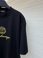 Dark short-sleeve T-shirt with Balenciaga gold crest detail